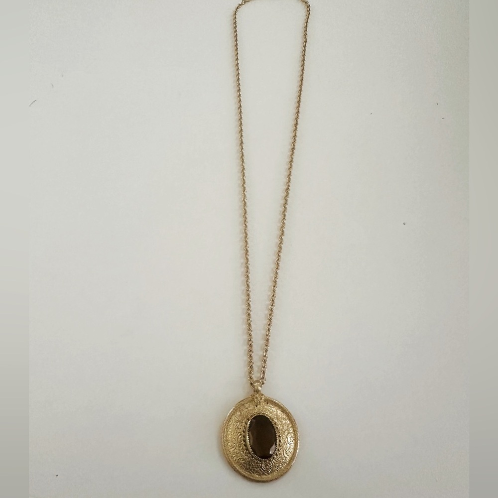 Vintage Emmons gold tone textured faceted brown crystal pendant.